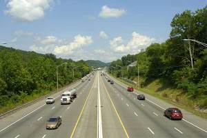 Vehicles and semi-trucks driving on an interstate